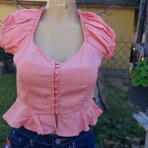 Brand new with tags. Fits like a crop top